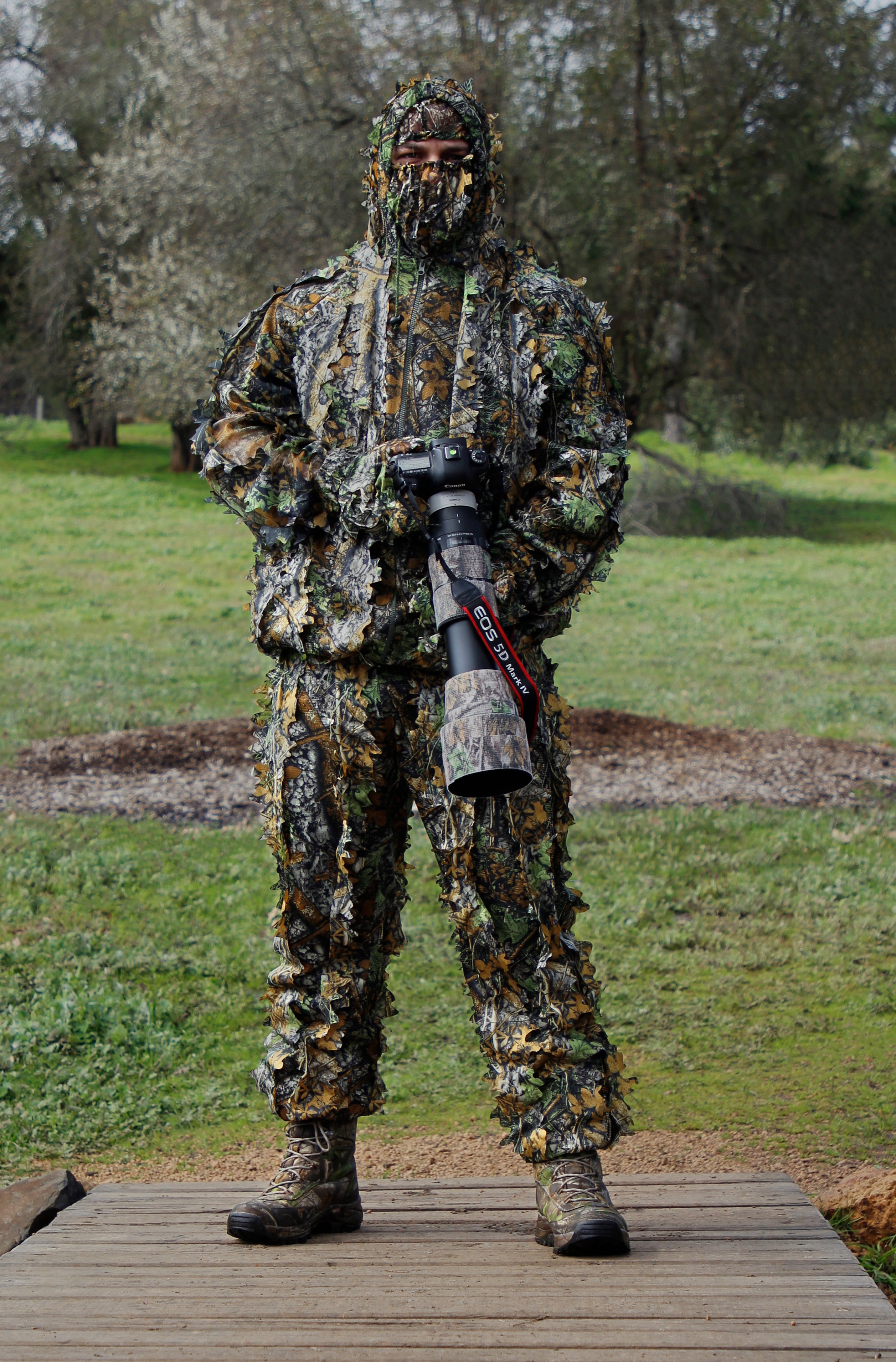 Fares Halout, fine art wildlife photographer, in ghillie suit camouflage at Golden Valley Tree Park, Western Australia